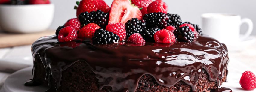 Chocolate cake with fresh berries, coloured and flavoured using Codchem food ingredients